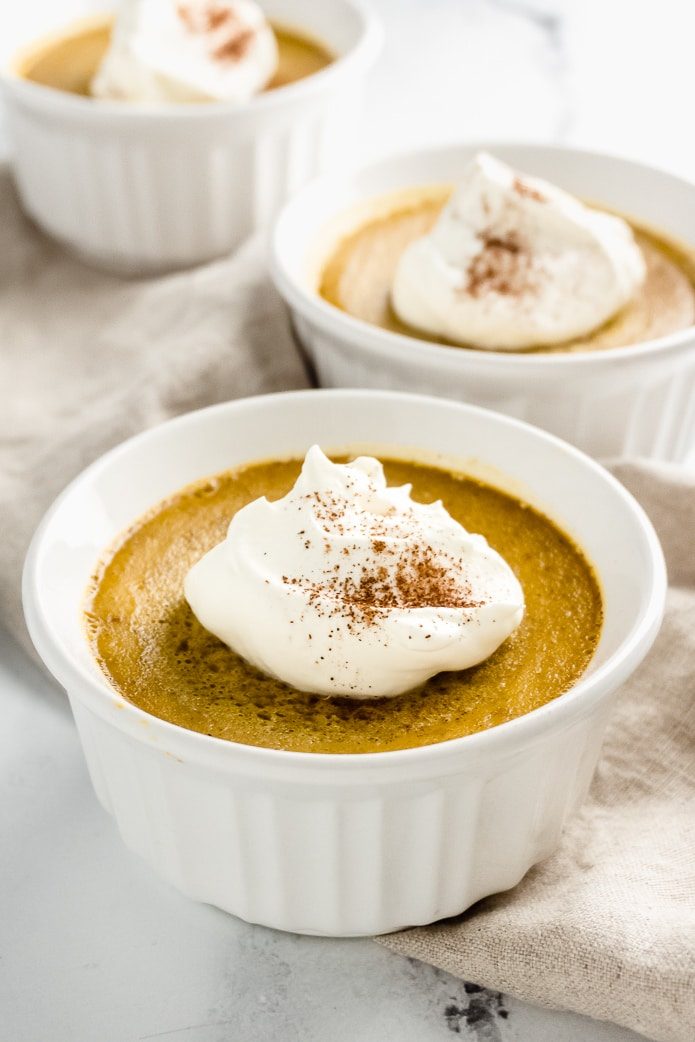 close up image of pumpkin custard cups that are keto and gluten-free