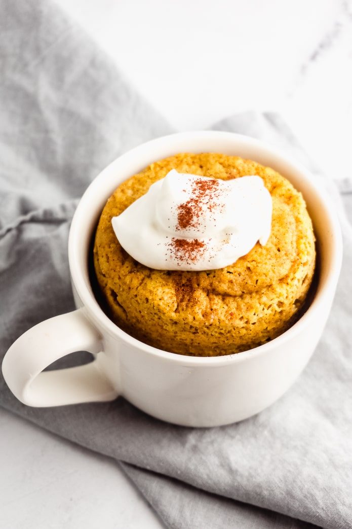 low-carb gluten-free pumpkin mug cake with whipped cream