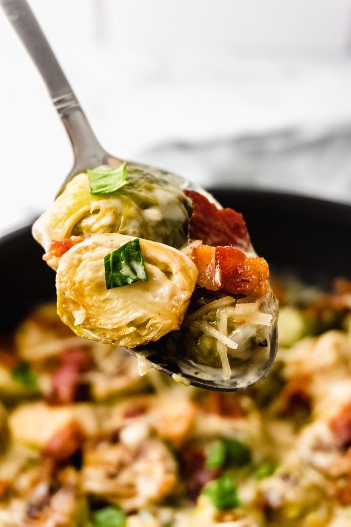 brussels sprouts with cream sauce, parmesan cheese, and bacon