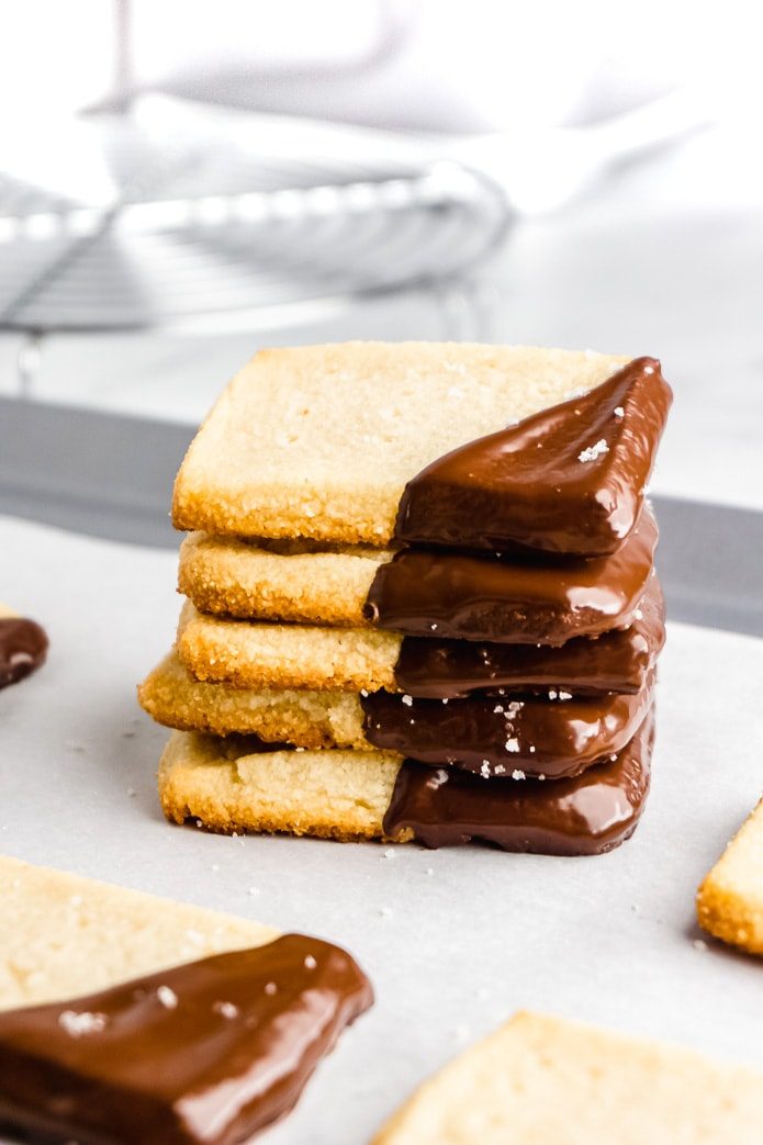 stack of chocolate dipped keto shortbread cookies