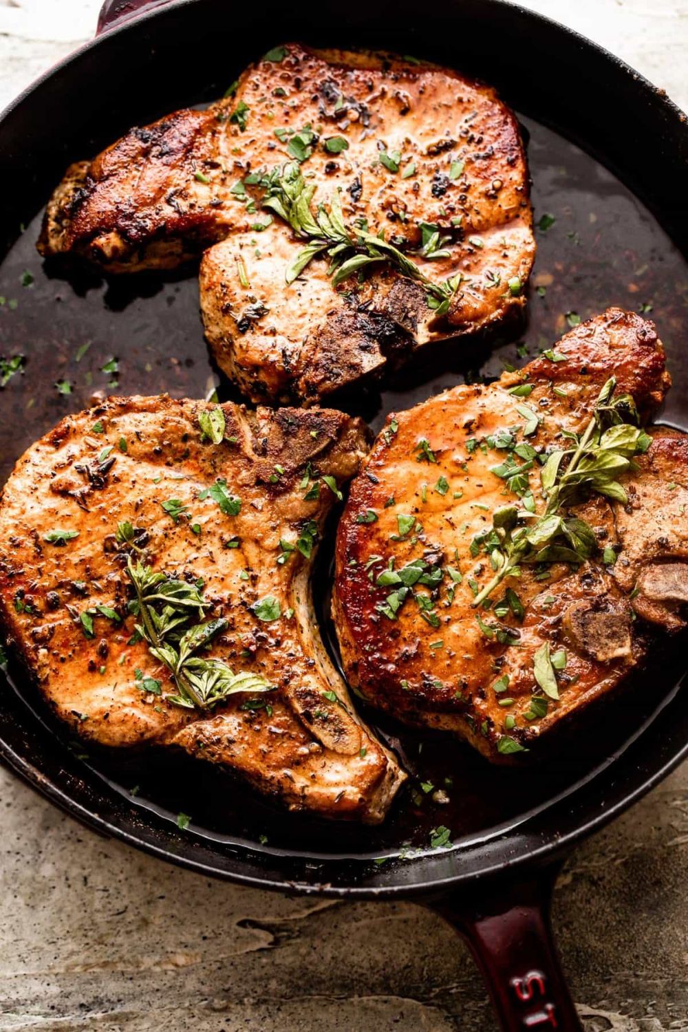 keto bone-in oven-baked pork chops with garlic butter sauce