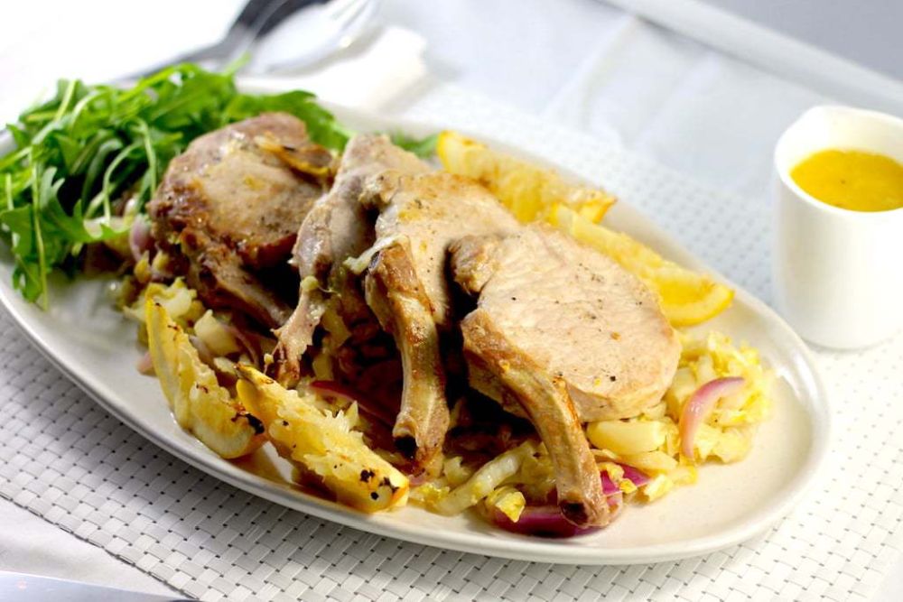 Keto baked pork chops with cider and cabbage